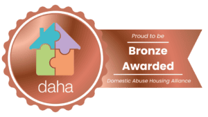 A bronze rosette showing DAHA accreditation